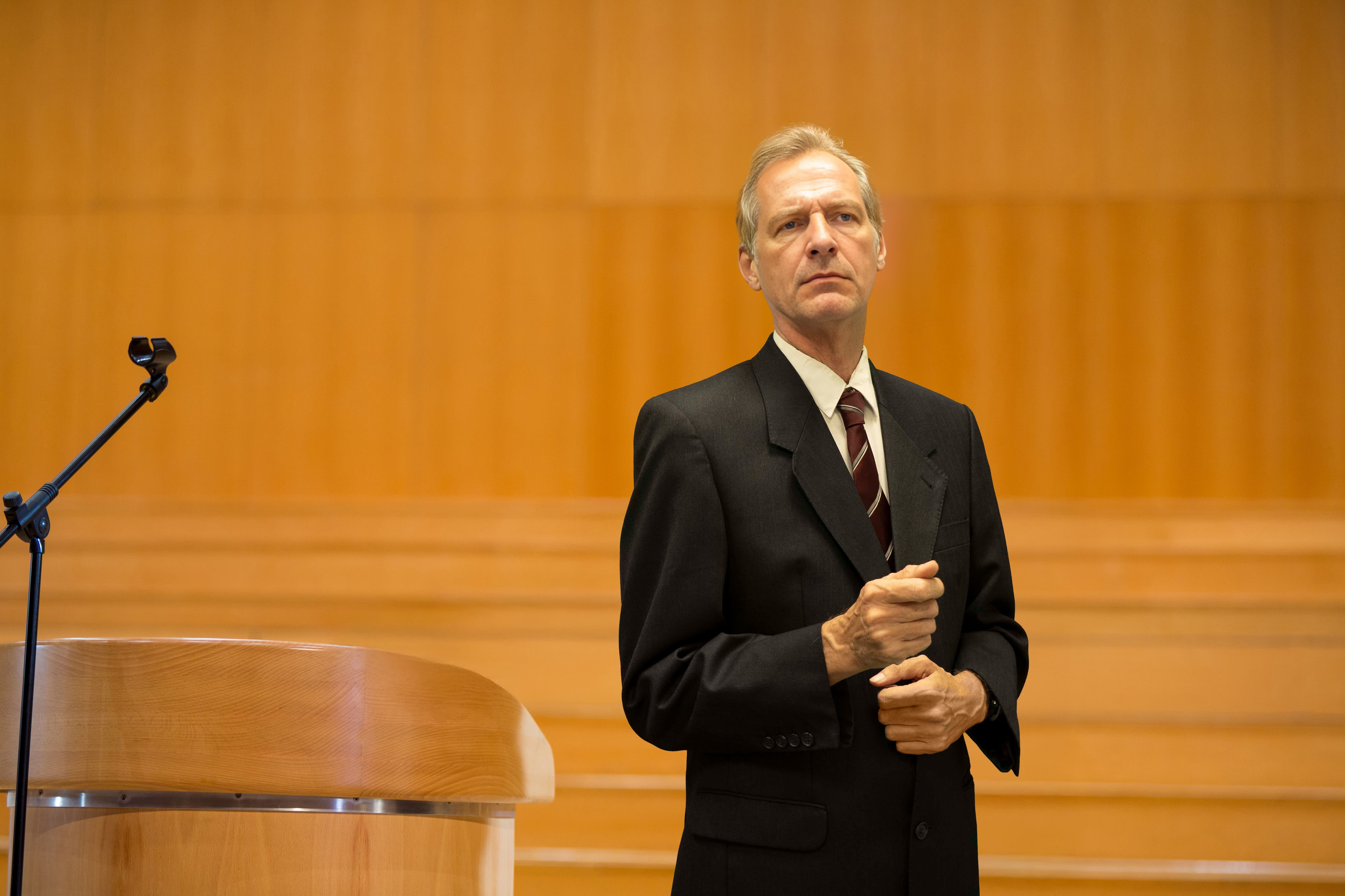 Daniel J. Impens in a discussion setting